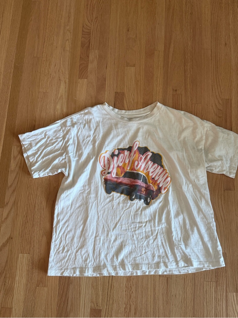 Djerf Avenue White Tee with Red Car Graphic and Yellow Accents